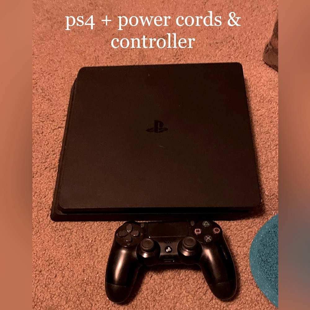 PLAY STATION 4 comes with power cord and controller.